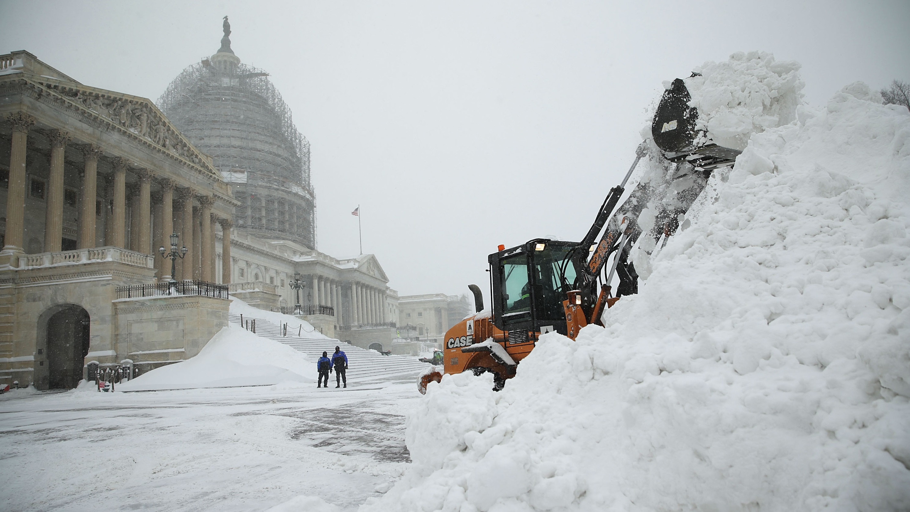 Battered East Coast begins digging out from deadly blizzard